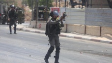 İsrail askerleri Kudüs'te 10 Filistinli genci yaraladı