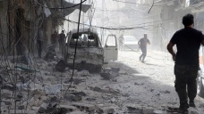 Suriye'de varil ve vakum bombalı saldırı: 28 ölü